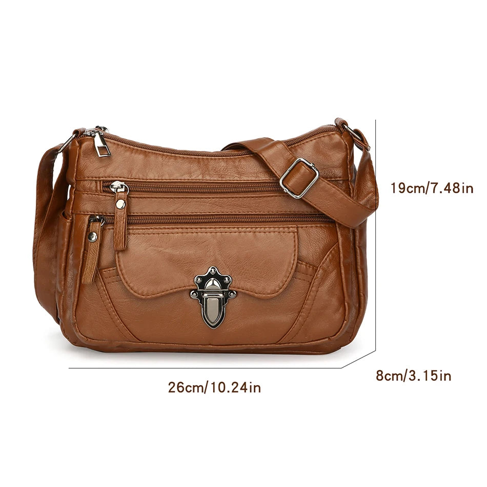 Brown leather handbag with measurements on a white background
