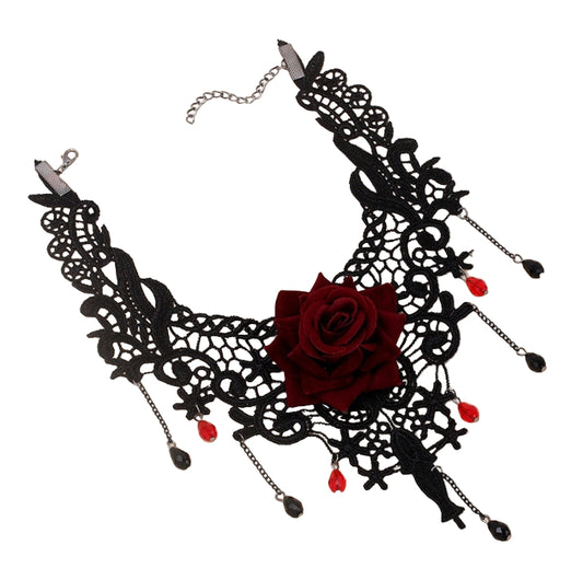 Black lace necklace with a red rose and red beads on a white background