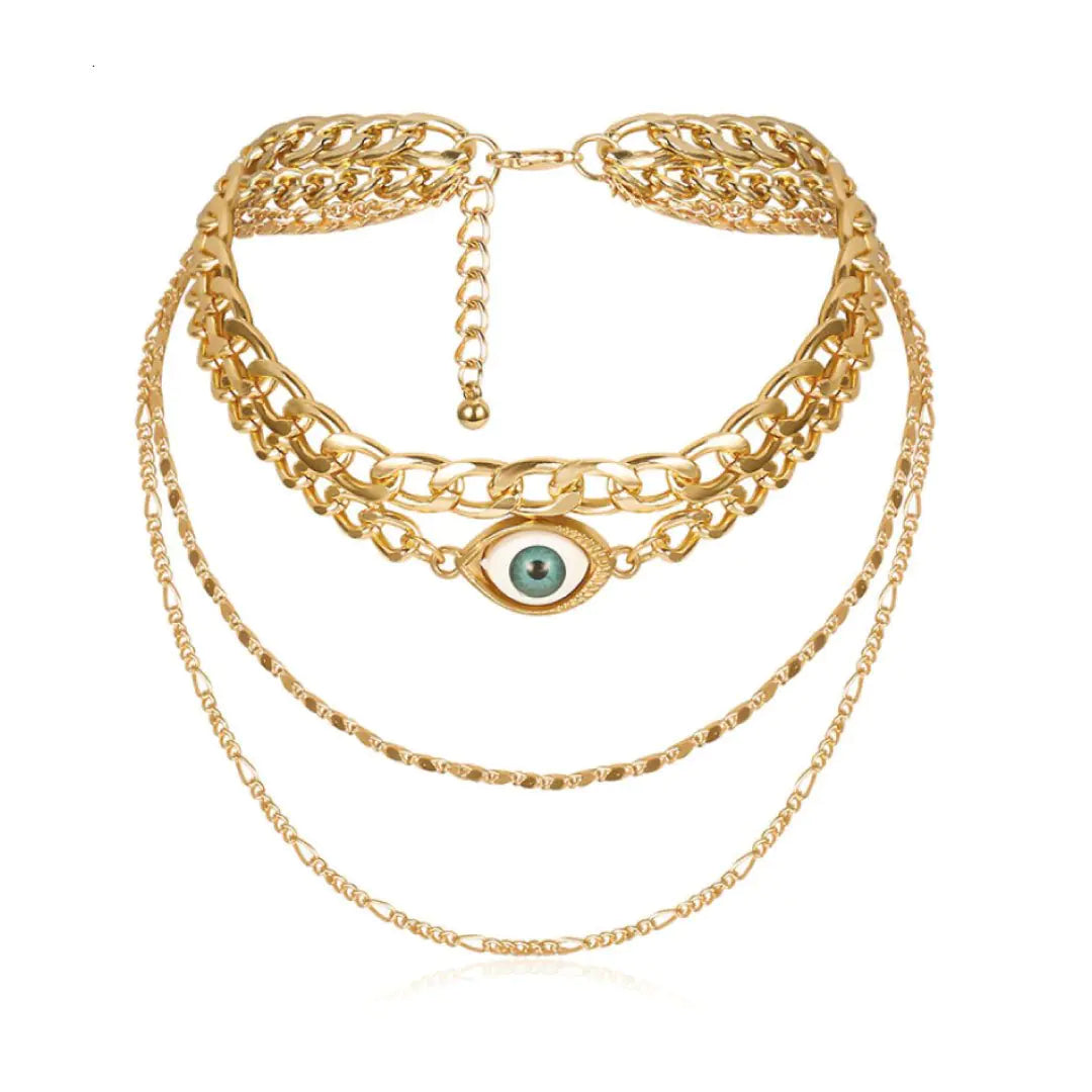Crew Necklace layered with gold chains and evil eye pendant