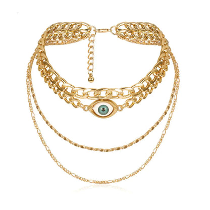 Crew Necklace layered with gold chains and evil eye pendant