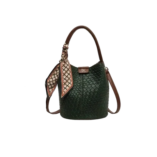 Green textured handbag with decorative strap on a white background