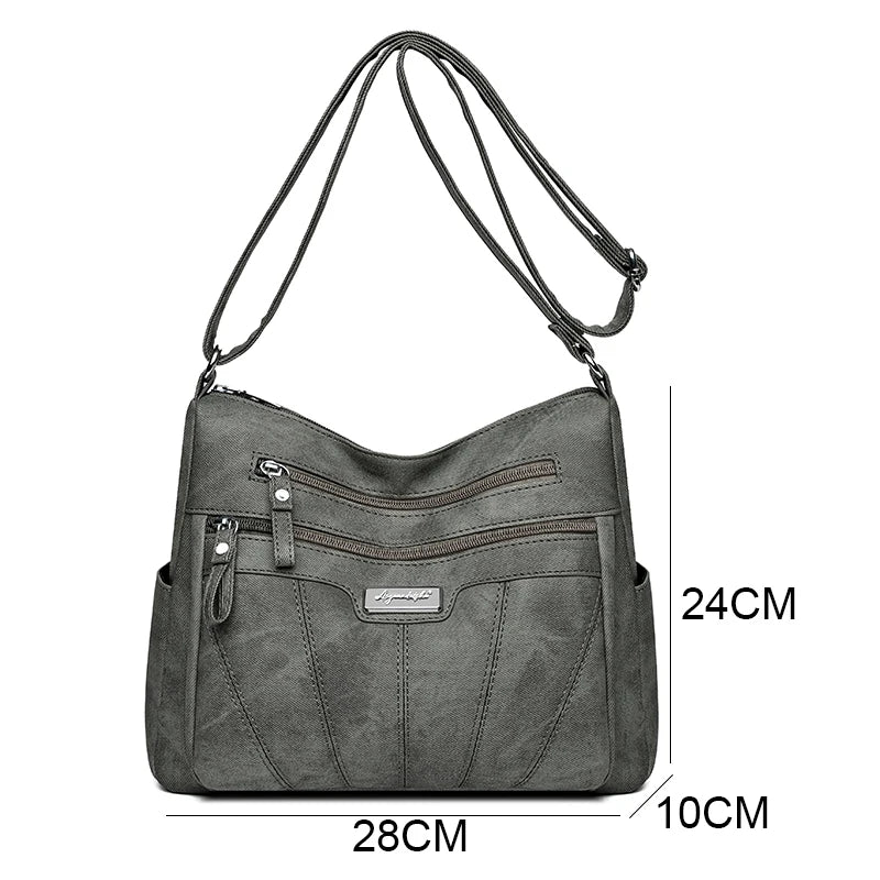 Gray handbag with measurements on a white background