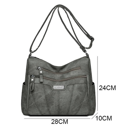 Gray handbag with measurements on a white background