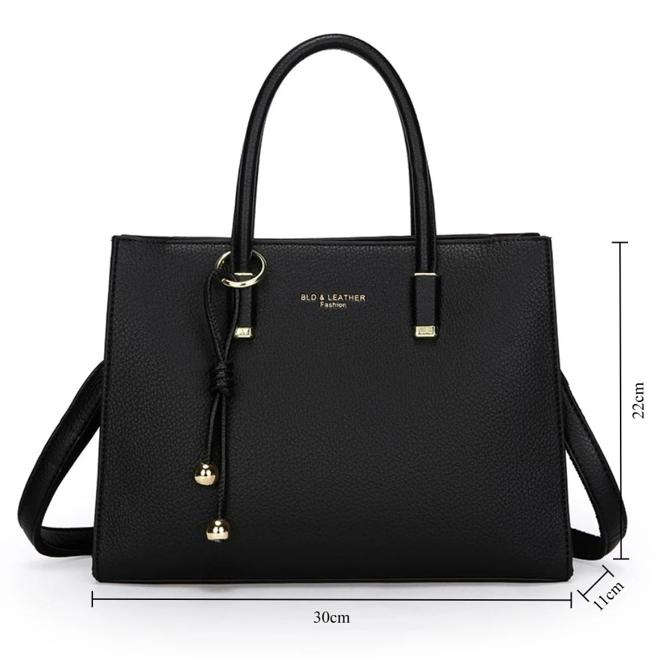 Black handbag with measurements on a white background
