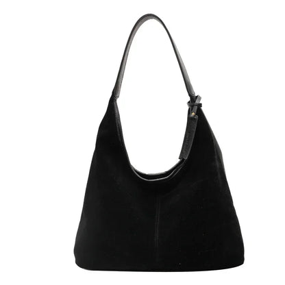 Black handbag on a white background