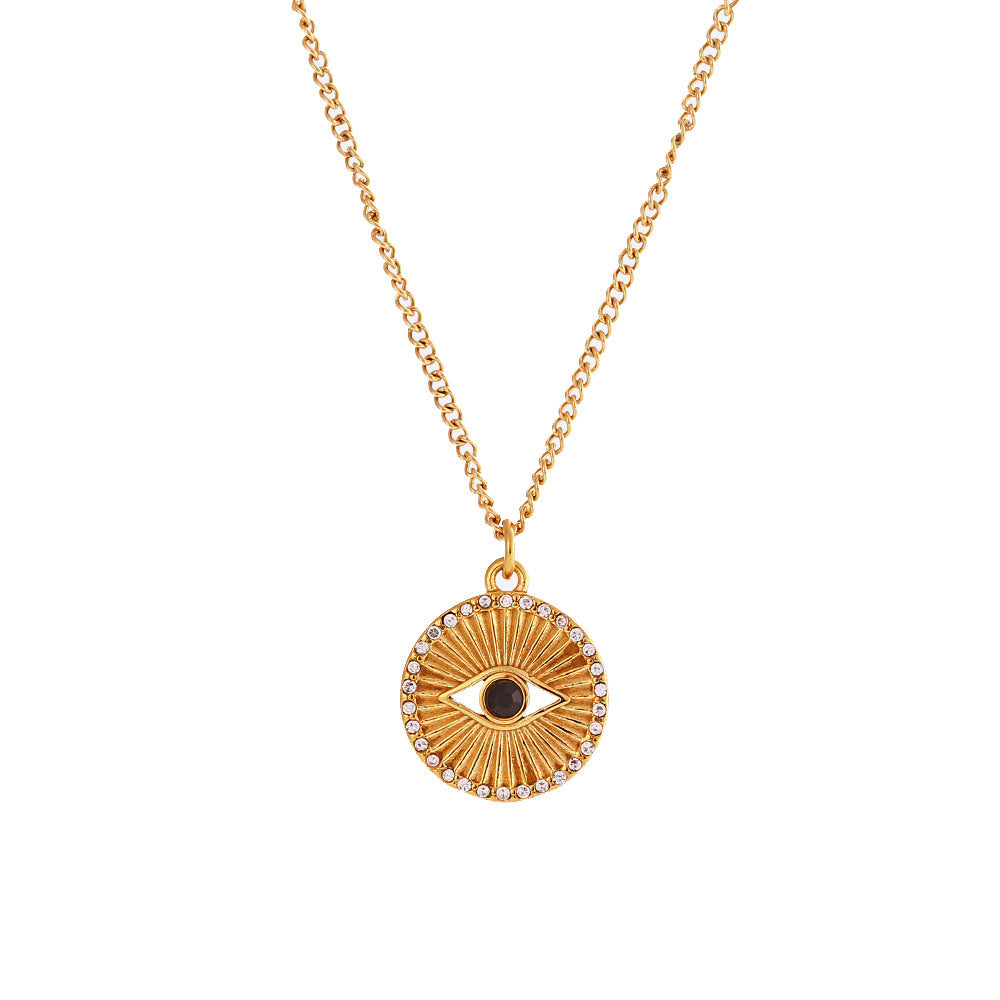 Minimalist gold coin necklace with black eye rhinestone and rising sun design on stainless steel chain